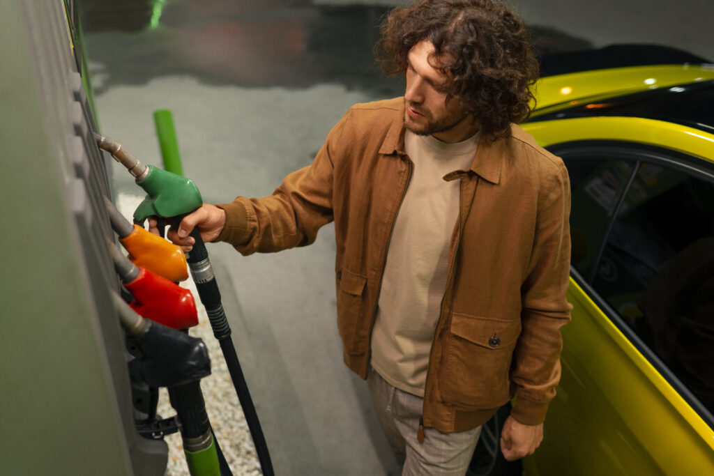high-angle-man-gas-station